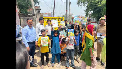 Relief camps bring hope to fire-hit families, kids smile as they get new books