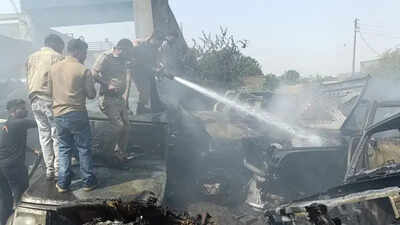 Discarded vehicles gutted at scrap workshop