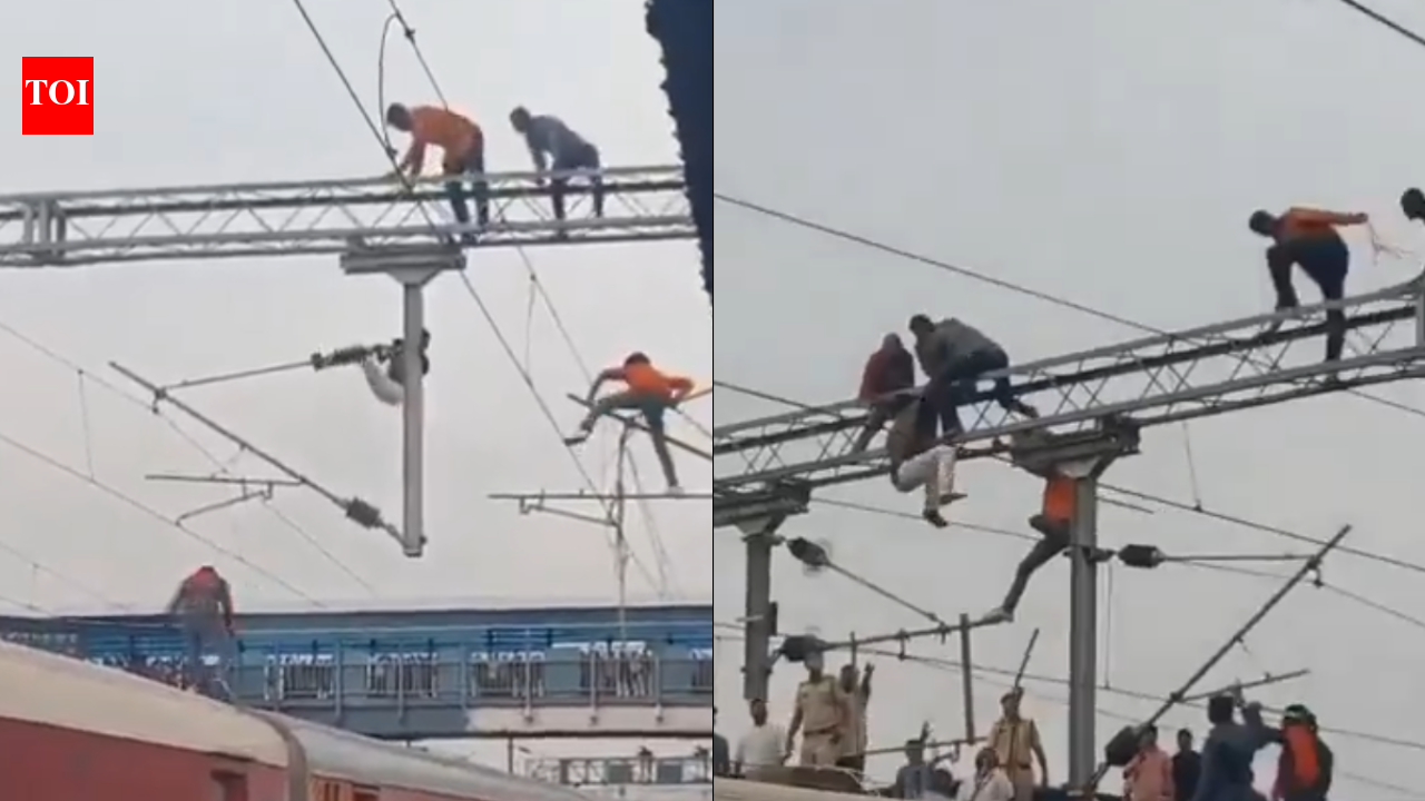 Man climbs gantry, dangles from high-tension wires at Maharashtra’s railway station; services hit for 40 minutes