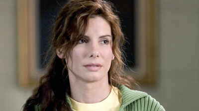 Quote of the day by Sandra Bullock: 'You bounce back by figuring it's for a reason and it happened to take you to a better place'