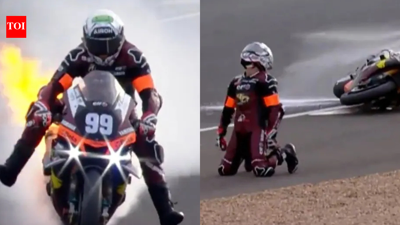 Alessandro Delbianco drops to knees in shock after motorbike catches fire during 24 Hours of Le Mans