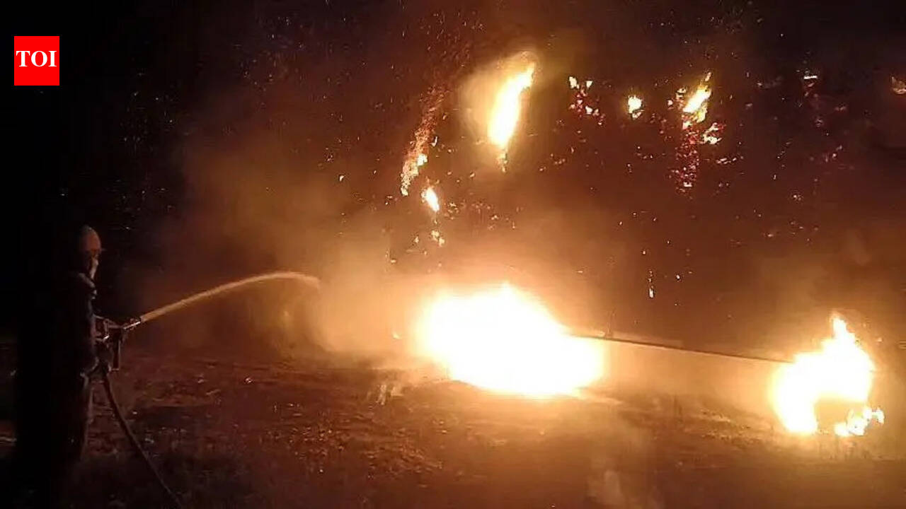 Hay touches wire, flames from tractor leap to house & shop