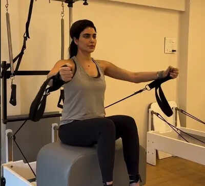 Mom-to-be Karishma Tanna flaunts her baby bump and shines in pregnancy glow as she works out in the gym