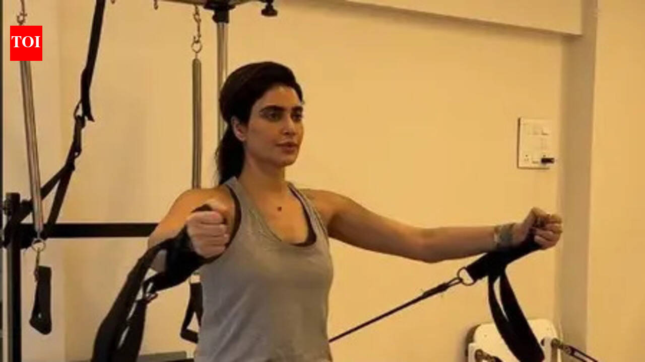 Mom-to-be Karishma Tanna flaunts her baby bump and shines in pregnancy glow as she works out in the gym