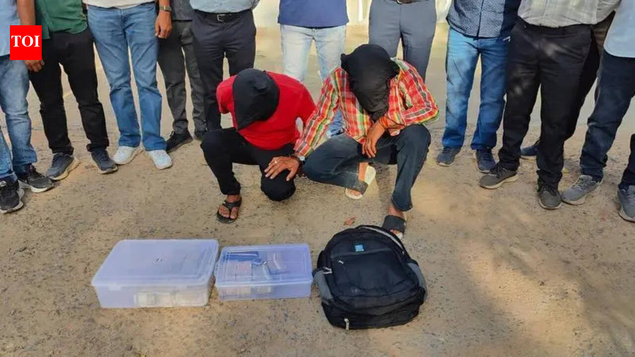 Duo who robbed Rs 64 lakh of job aspirant nabbed | Rajkot News - The ...