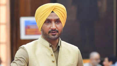 Harbhajan Singh: Former India cricketer Harbhajan Singh joins BJP, quits Aam Aadmi Party | Cricket News – The Times of India