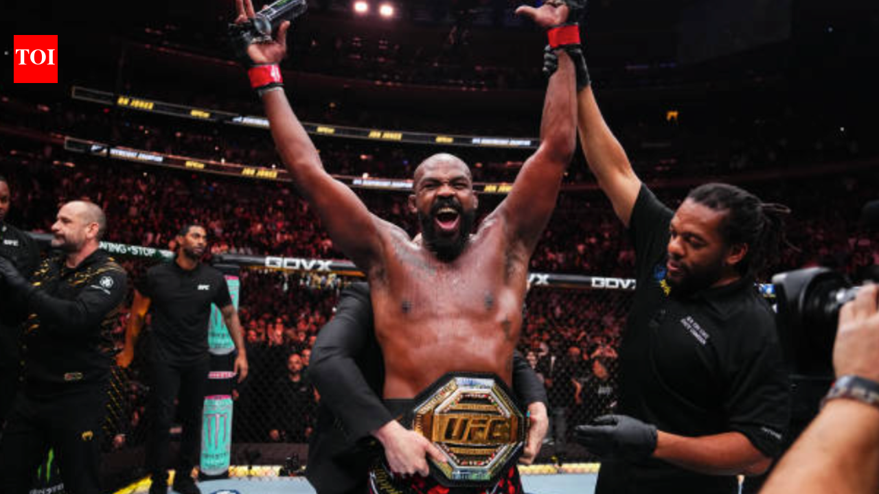 Jon Jones trolls Kamaru Usman and WWE retired legend Brock Lesnar with outrageous “getting hand raised at both of you in one night” claim