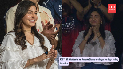 As Virat Kohli shines on the field, all eyes turn to Anushka Sharma at RCB match - what was the tiny black gadget in her hand?