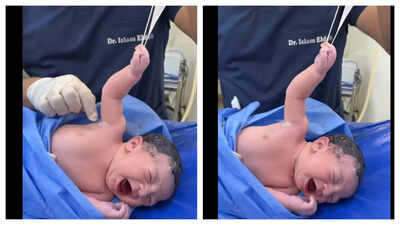 Viral Baby Video: Newborn baby's adorable grip on Doctor's glove captivates millions