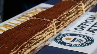 100 chefs in London use 50,000 biscuits to make 440 meters of tiramisu, setting a Guinness World Record