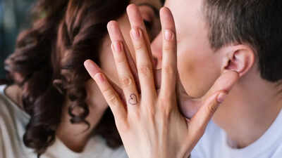 Diamonds, who? Gen Z couples are ditching pricey rocks for tattooed engagement rings