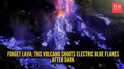 This volcano doesn't glow red - it turns electric blue at night and looks straight out of a sci-fi movie