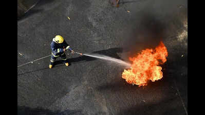 Fire breaks out in Manpada along border of Sanjay Gandhi National Park, spreads in jungle area, is doused by Thane Municipal Corporation and forest department staffers