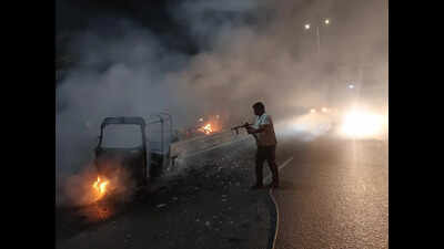 Auto goes up in flames on NH-8, driver dies