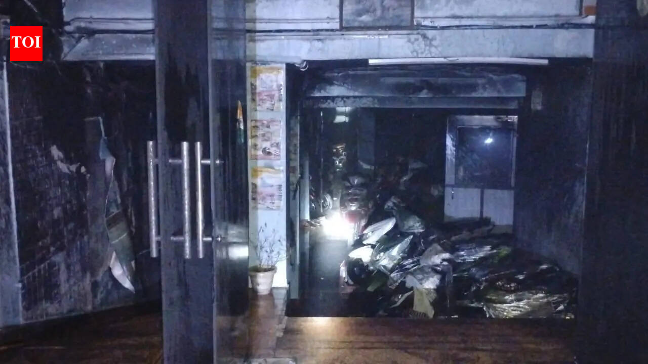 Panic in multi-storey building after EV showroom fire