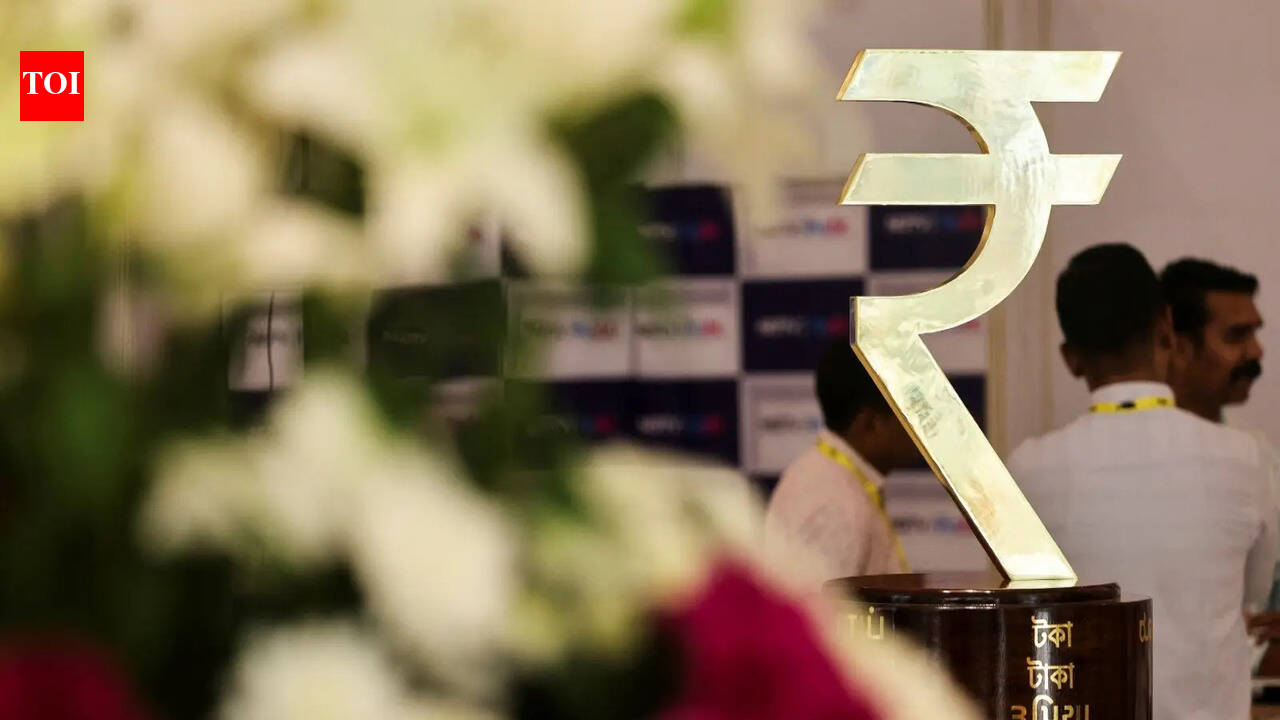 Rupee slips 35 paise vs US dollar, Sensex falls 416 points – The Times of India