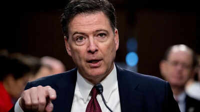 Former FBI Director James Comey turns himself in in 'threat' case against Donald Trump; what is the '86 47' post?