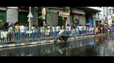 Driven by SIR fear, citizens brave rain, sun to reach booths