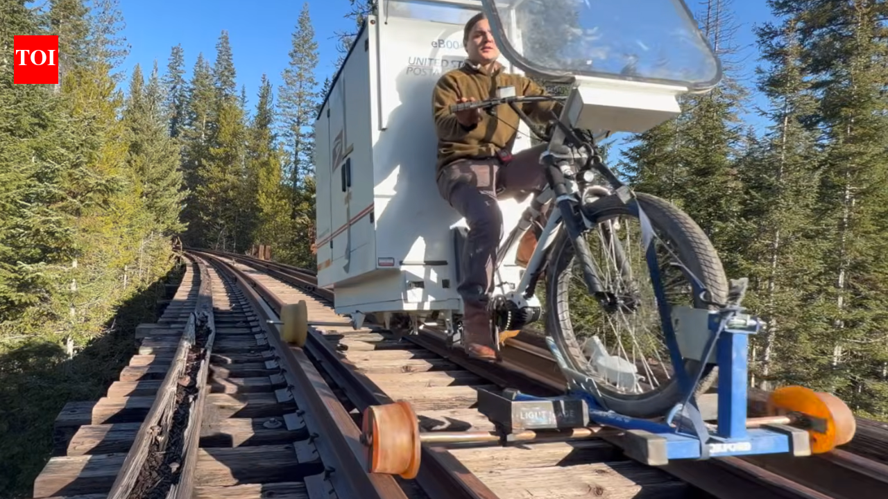 Crazy adventure: YouTuber rides 100 miles on abandoned railway tracks in a DIY rail camper