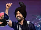 Diljit Dosanjh  calls out protesters at concert: 'Jitne jhande dikhane, dhikhao' - WATCH