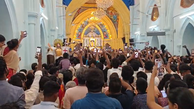 TVK chief Vijay supporters chant slogans inside church in Velankanni