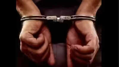 Man held for threatening woman with private photos