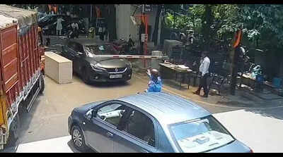 Man stopped from leaving society over dues, smashes gate with car, assaults guard
