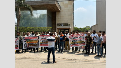Residents protest delays, poor upkeep of society, demand transparency