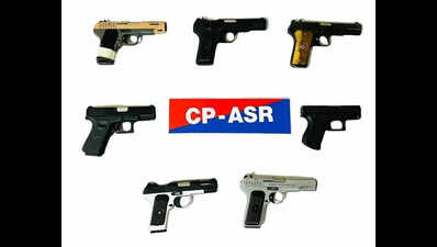 Seven pistols, heroin seized in Amritsar