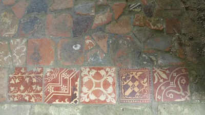 A biscuit tin secret comes to light as a former thief returns medieval tiles after sixty years