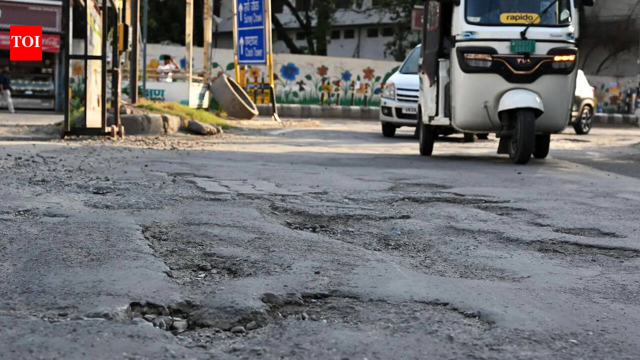 Pedestrians forced to wade through road amid broken footpaths on Sahastradhara Road