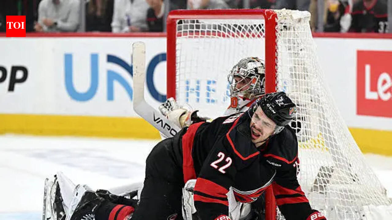 Philadelphia Flyers goaltender Dan Vladar confronts Logan Stankoven during Carolina Hurricanes NHL playoff Game 2 match