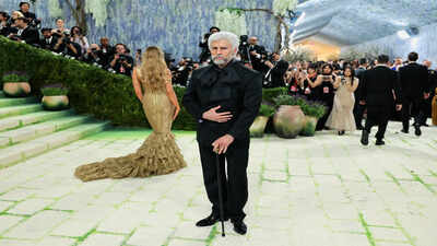 Bad Bunny transforms into old man with a walking stick at Met Gala 2026