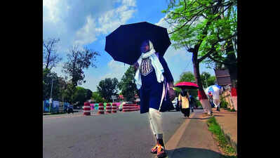 Rain, hailstorm cool city, bring flight disruptions