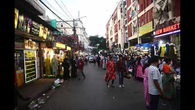 A day after payloader run, cautious New Market hawkers make a return