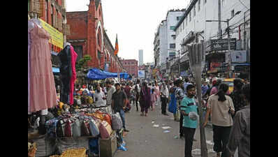 Hawkers, shoppers back at New Market, union offices razed