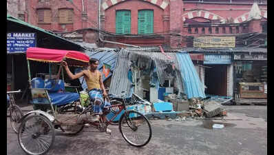 Hawkers, shoppers back at New Market, union offices razed