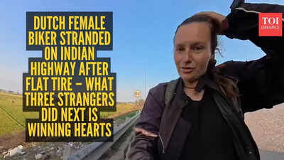 Dutch female biker stranded on Indian highway after flat tire – what three strangers did next is winning hearts