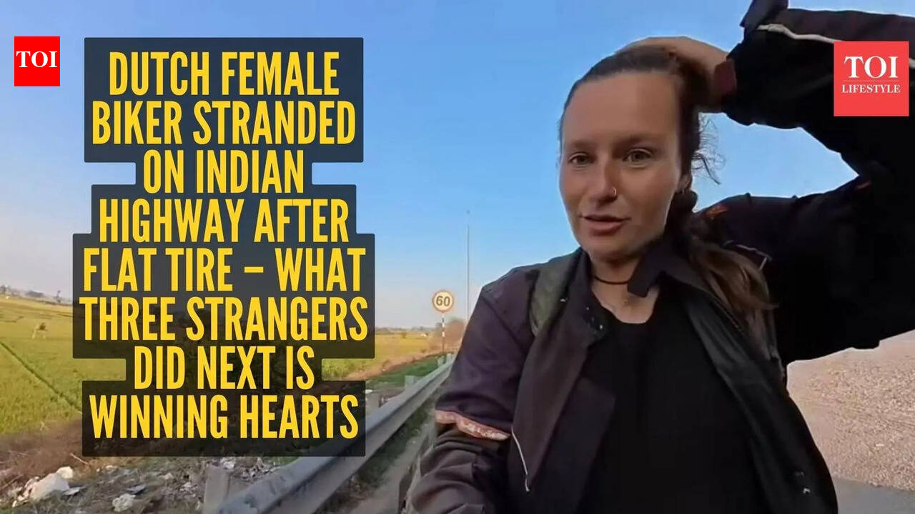Dutch female biker stranded on Indian highway after flat tire – what three strangers did next is winning hearts