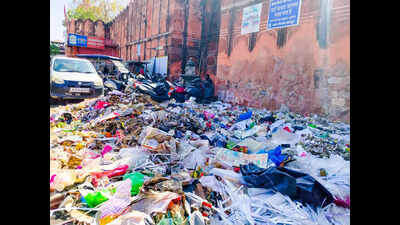 Beyond the one-day clean-up: walled city residents struggle with daily garbage piles