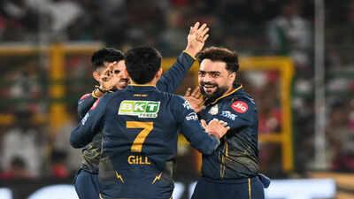 jaipur-may-09-ani-gujarat-titans39-rashid-khan-and-teammates-celebrate-the-wi.jpg