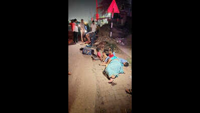 Auto hit by truck overturns, toddler & 2 women die