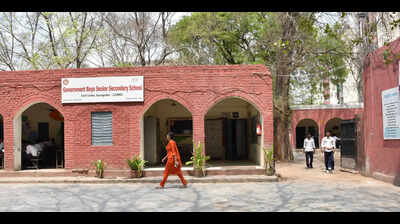 School shrinks for new hospital, revamp plan stuck in files