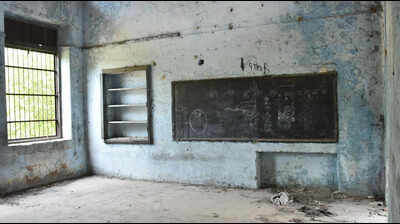 School shrinks for new hospital, revamp plan stuck in files