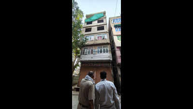 Fear in Walled City after pillar shifts during illegal construction