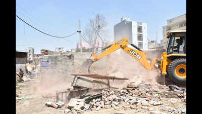 Offices to liquor dens, gangsters’ properties on govt land razed