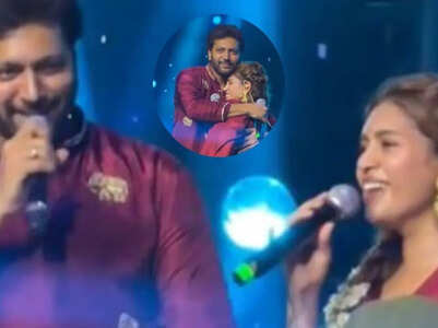 Ravi Mohan hugs Kenishaa after romantic song performance on stage