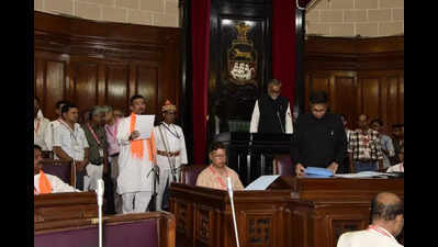 Heeding PM’s call, MLAs take buses to assembly to take oath