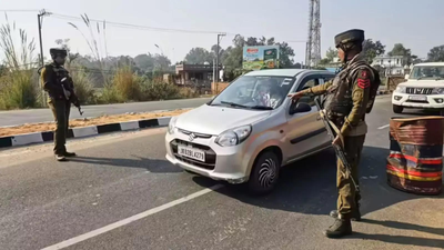 Teacher among 2 held for aiding terrorists in J&K | India News – The Times of India