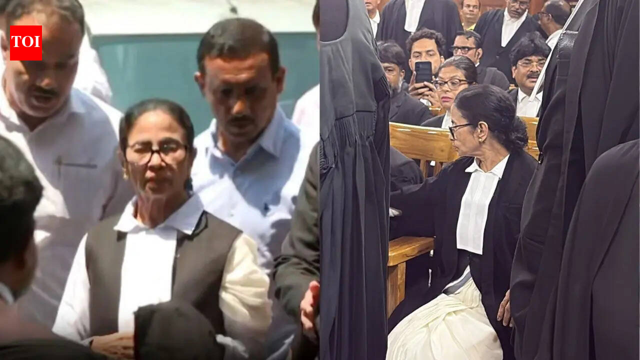 Mamata dons lawyers' robes, arrives at Calcutta HC in post-poll violence case